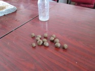 In the workshop, the powder is mixed with water and rolled to create the beads
