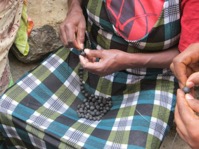 Here the beads are being strung 